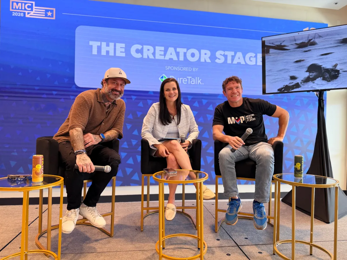 Ryan Beckmann, Jessica Manfre, and Nate Boyer seated with microphones on the Creator Stage at MIC 2026.